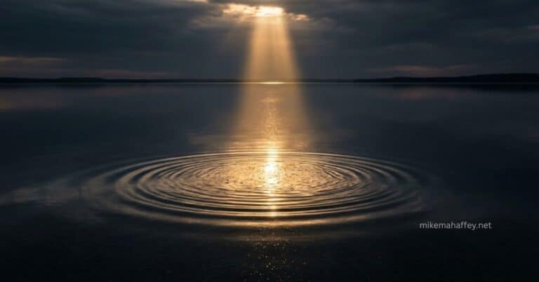 A shaft of golden light breaks through dark storm clouds and descends onto a calm lake, creating ripples that spread outward across the still water, illustrating that salvation comes from grace descending from God not from the act of baptism itself.