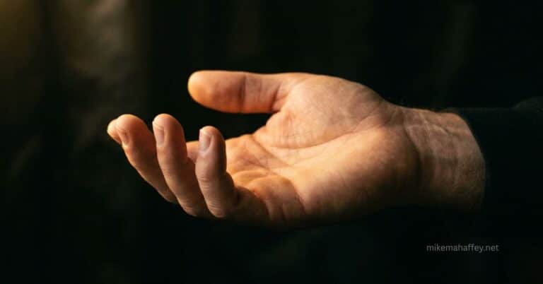 An open hand in warm light — a visual of how to plead the blood of Jesus in prayer as a declaration, not a desperate plea.